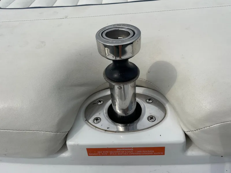 Slide: The Image of 2006 Cobalt 24SX boat seat with a stainless steel mount. - 36