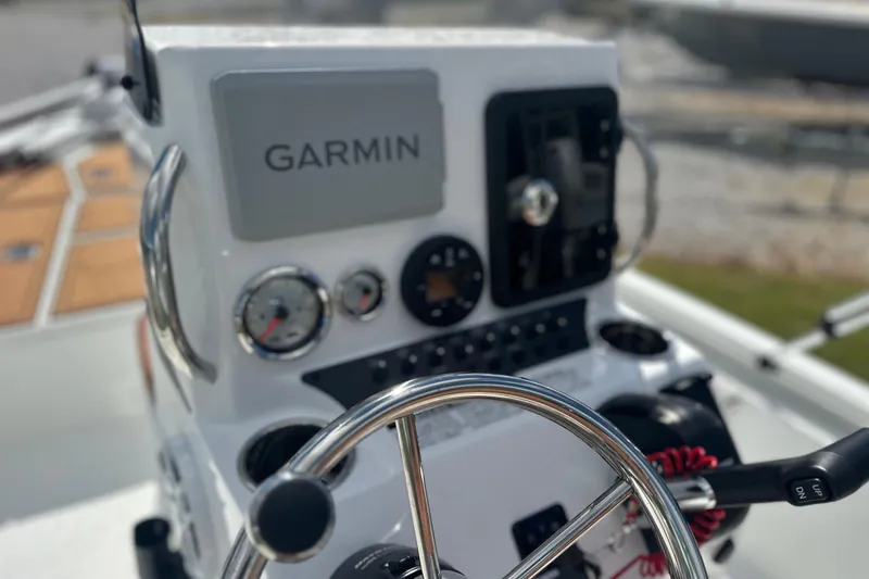 Slide: The Image of Steering console of 2026 Avid 19 FSX boat with Garmin navigation system. - 11