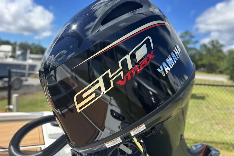 Slide: The Image of Yamaha SHO VMAX outboard motor on 2026 Avid 19 FSX boat, sunny day background. - 15