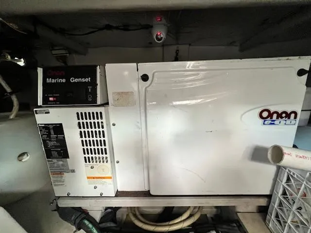 Slide: The Image of Onan marine generator inside a 2005 Sea Ray 500 Sundancer yacht. - 20