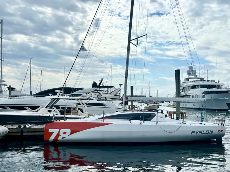 Slide: The Image of 2023 Jeanneau Sun Fast 3300 sailboat docked at marina, hull number 78. - 2