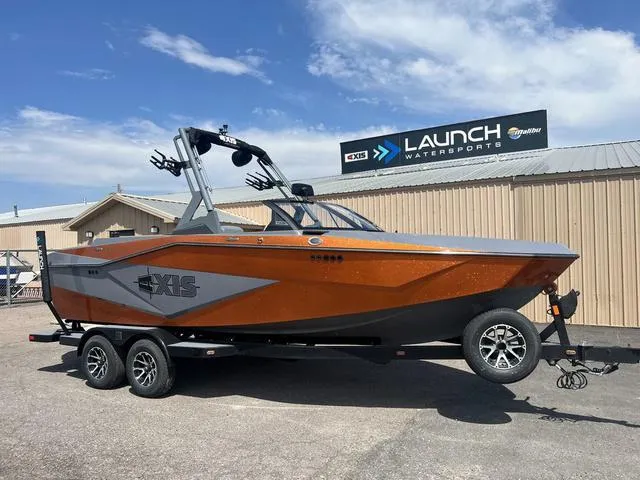 Slide: The Image of 2023 Axis Wake Research T220 boat at Launch Watersports dealership. - 5