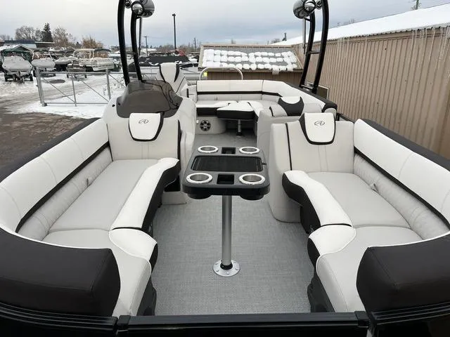 Slide: The Image of 2023 Avalon 25 Catalina Rear J Lounger pontoon boat with luxurious seating and cup holders. - 4