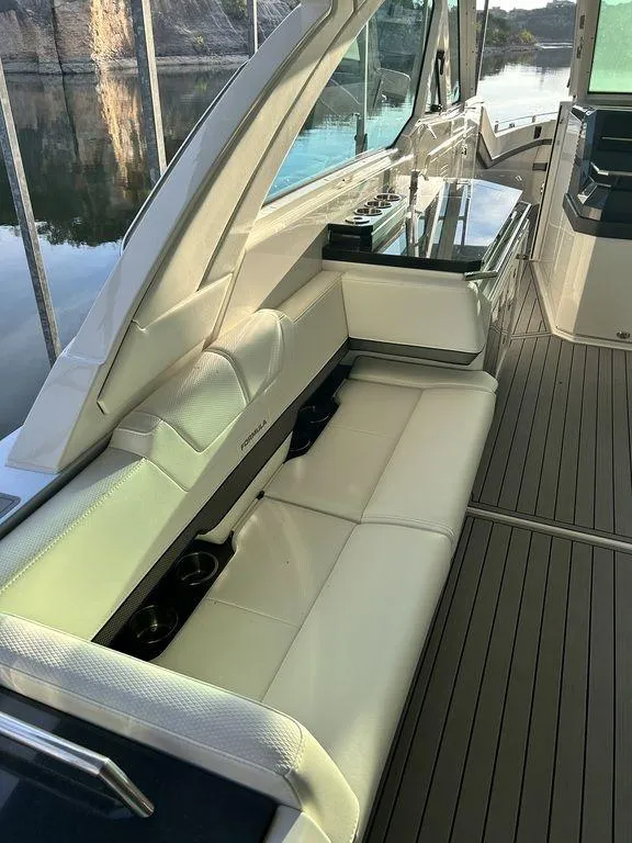 Slide: The Image of 2021 Formula 380 Super Sport Crossover interior with sleek seating and modern design. - 16