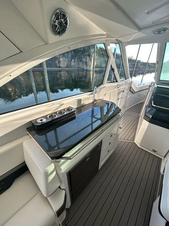 Slide: The Image of 2021 Formula 380 Super Sport Crossover interior with sleek design and modern amenities. - 18