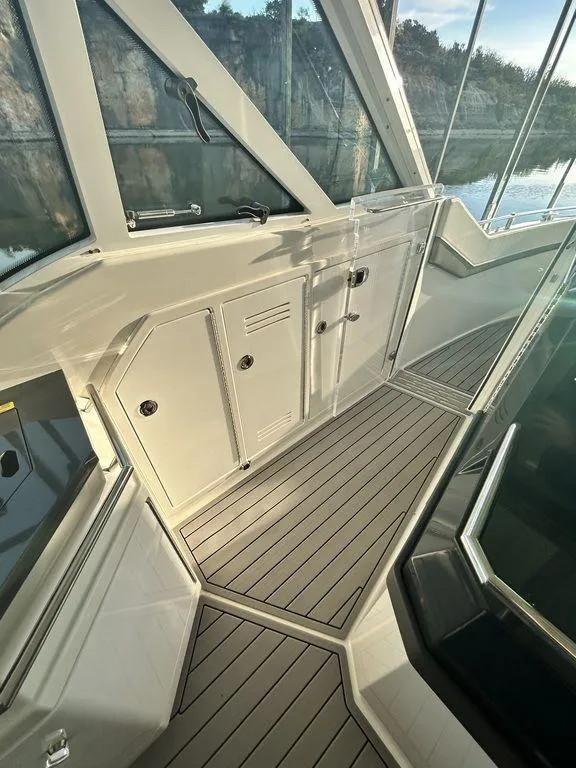 Slide: The Image of 2021 Formula 380 Super Sport Crossover boat interior with sleek design and modern finishes. - 22