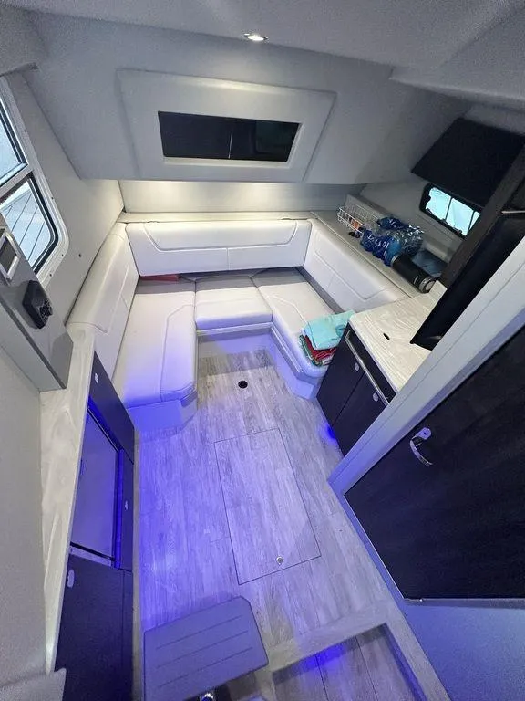 Slide: The Image of Interior of 2021 Formula 380 Super Sport Crossover with modern seating and ambient lighting. - 34