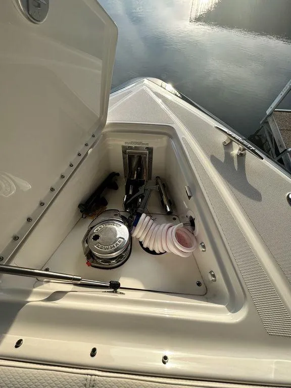 Slide: The Image of 2021 Formula 380 Super Sport Crossover boat storage compartment with equipment and accessories. - 35