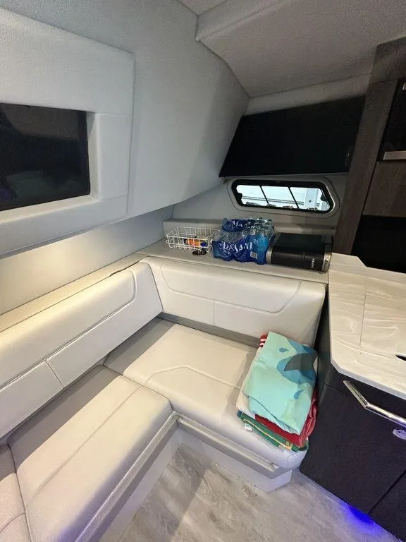 Slide: The Image of Interior of 2021 Formula 380 Super Sport Crossover with modern seating and storage. - 38