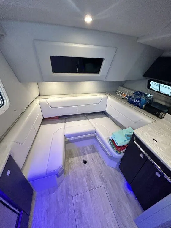 Slide: The Image of Interior of 2021 Formula 380 Super Sport Crossover with modern seating and ambient lighting. - 39