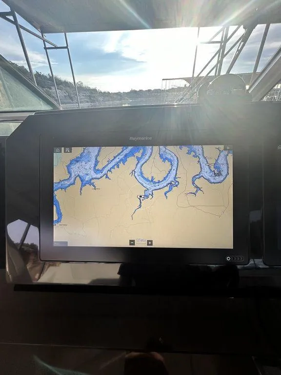 Slide: The Image of Boat navigation system displaying a waterway map on a 2021 Formula 380 Super Sport Crossover. - 42