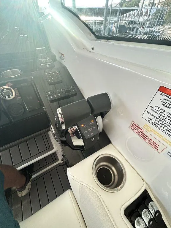 Slide: The Image of 2021 Formula 380 Super Sport Crossover cockpit controls and dashboard details. - 47