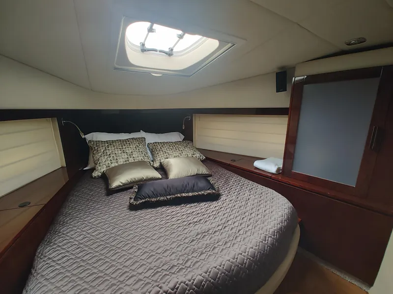 Slide: The Image of Luxurious bedroom interior of 2010 Sea Ray 540 Sundancer yacht. - 14