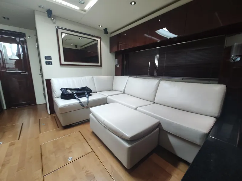 Slide: The Image of Luxurious interior of 2010 Sea Ray 540 Sundancer yacht with white leather seating. - 19