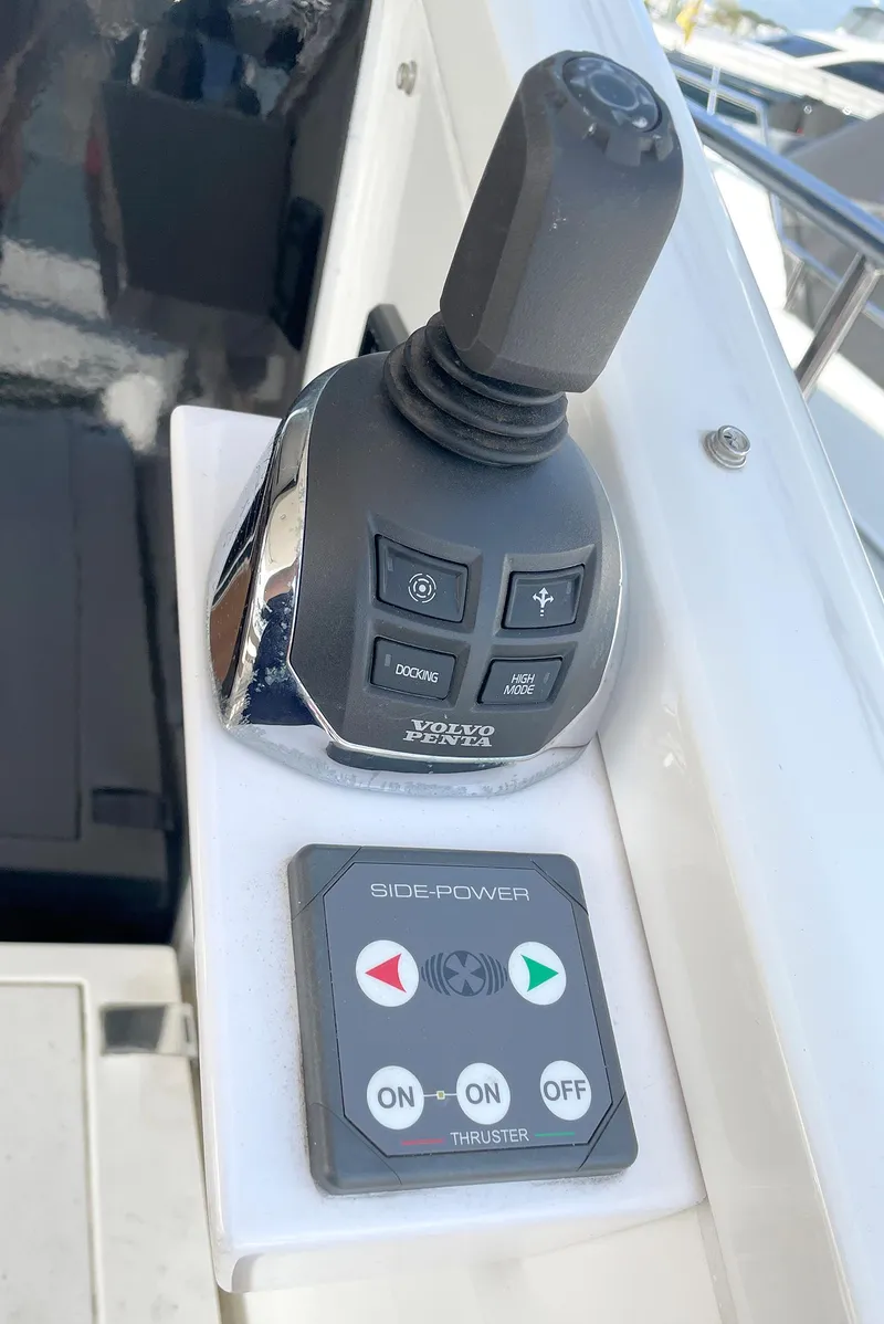 Slide: The Image of Joystick and control panel on a 2015 Fairline Targa 48 GT yacht. - 12