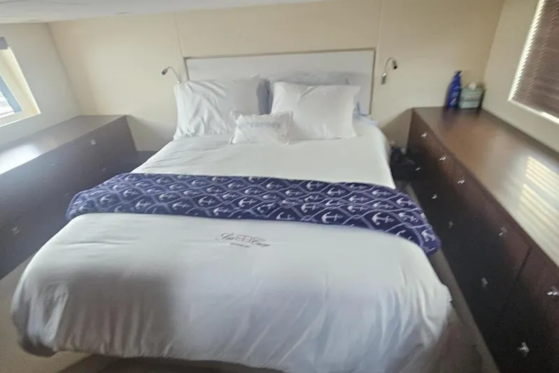 Slide: The Image of Luxurious bedroom interior of 2015 Fairline Targa 48 GT yacht with elegant bedding. - 26