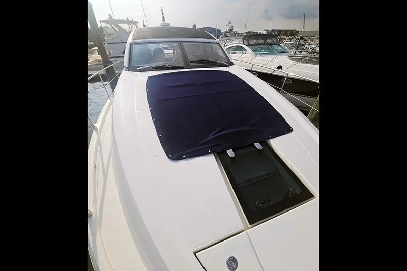 Slide: The Image of 2015 Fairline Targa 48 GT yacht docked at marina. - 4