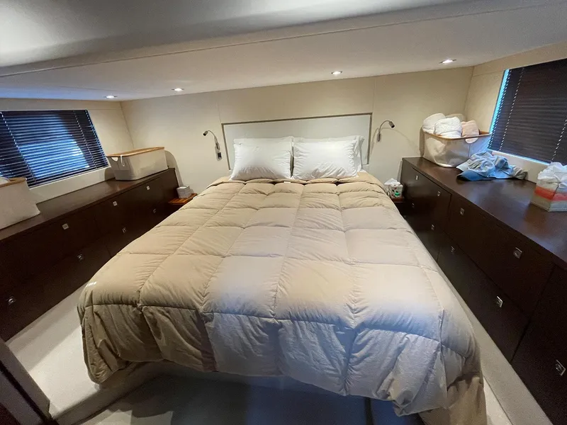 Slide: The Image of Luxurious bedroom in 2015 Fairline Targa 48 GT yacht with cozy bedding. - 8