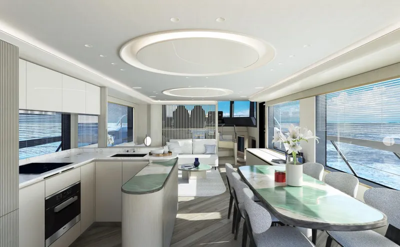 Slide: The Image of Luxurious interior of the 2025 Absolute 70' Navetta yacht with modern kitchen and dining area. - 13