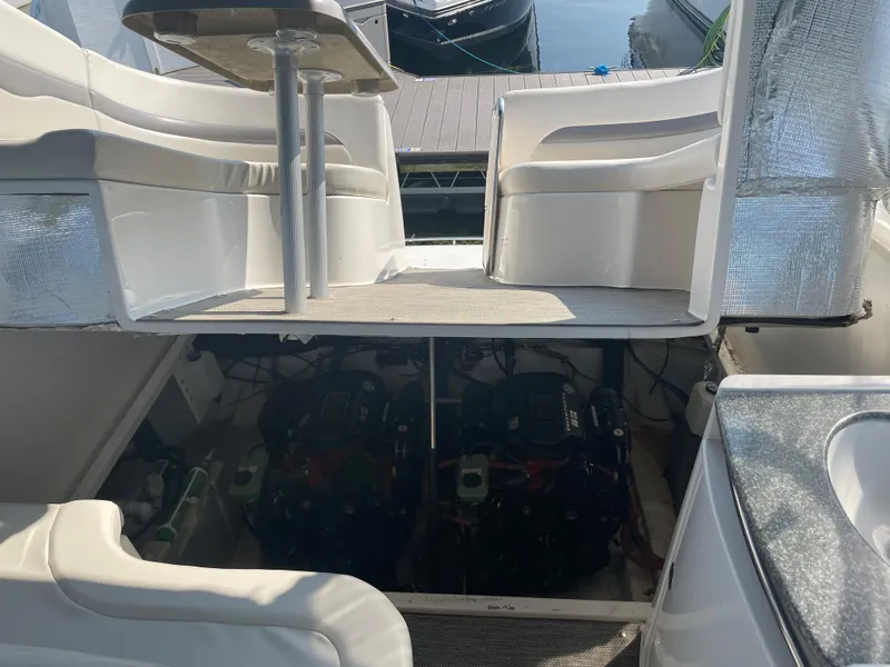 Slide: The Image of 2007 Chaparral 330 Signature boat interior with engine compartment open. - 18