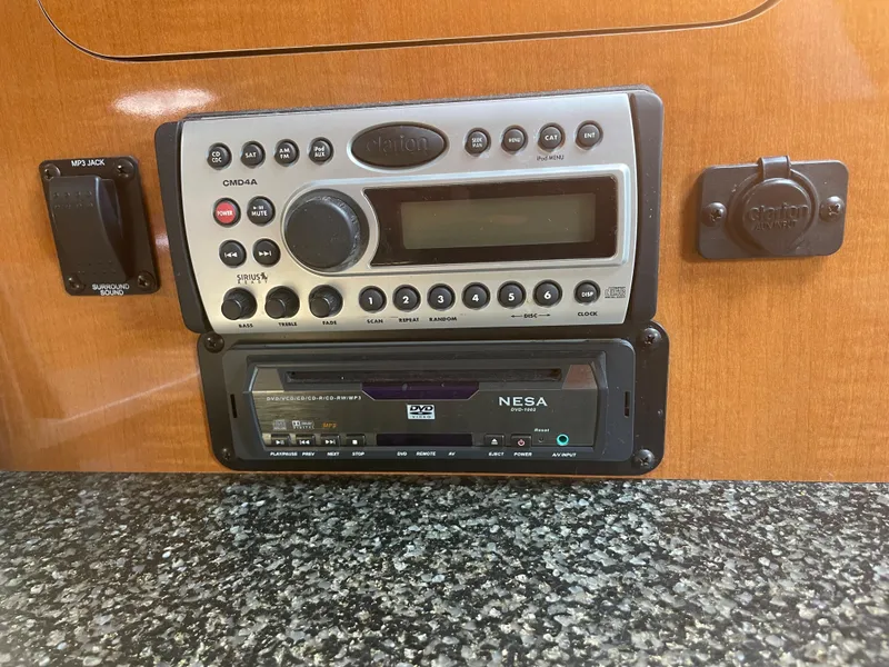 Slide: The Image of 2007 Chaparral 330 Signature audio system and control panel. - 28