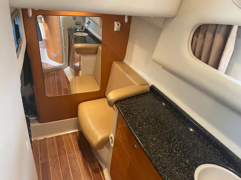Slide: The Image of Interior of 2007 Chaparral 330 Signature yacht with seating and countertop. - 36