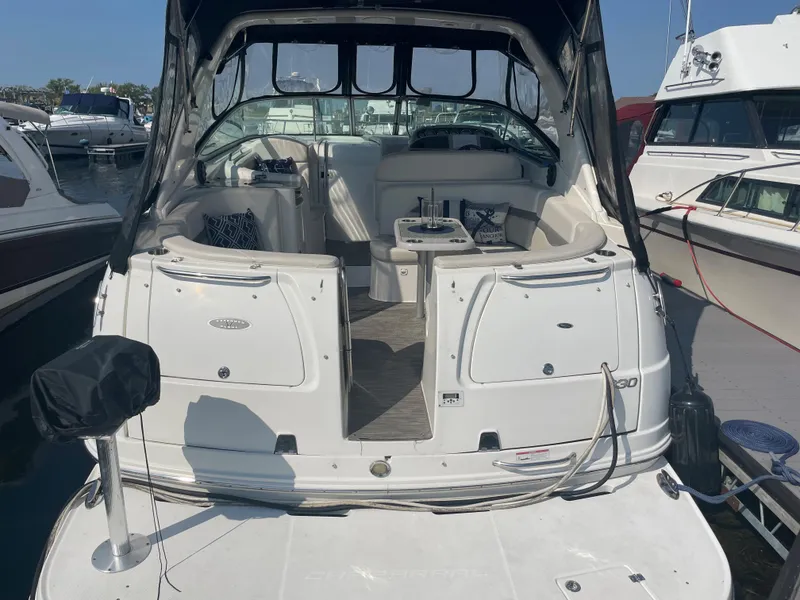 Slide: The Image of 2007 Chaparral 330 Signature yacht docked at marina, rear view. - 7