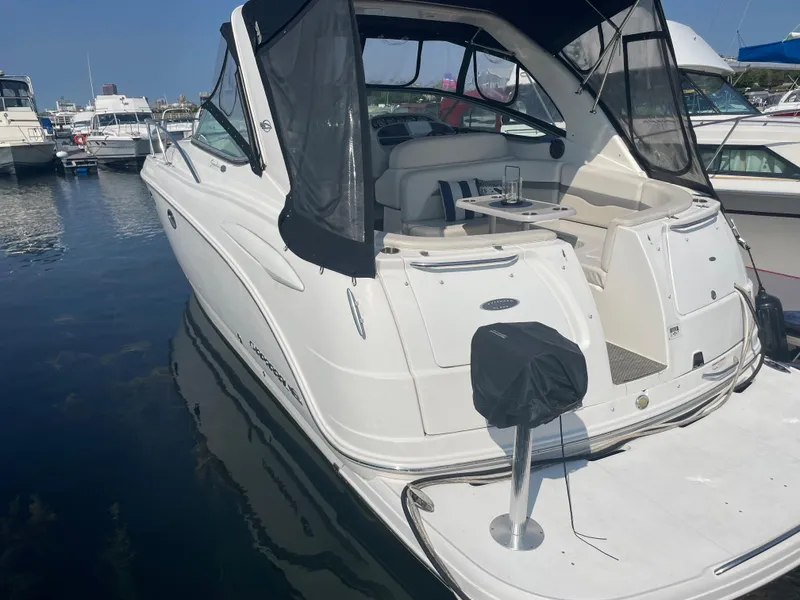 Slide: The Image of 2007 Chaparral 330 Signature boat docked in a marina. - 8