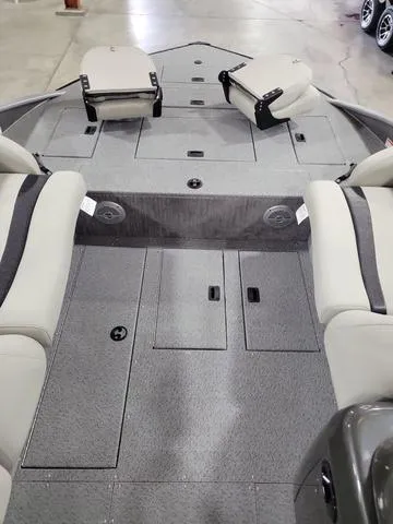 Slide: The Image of 2023 Lowe SD 224 boat interior with gray deck and seating. - 7