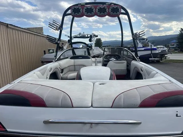 Slide: The Image of 2005 Malibu Sunsetter LXi boat with spacious seating and wakeboard tower. - 5