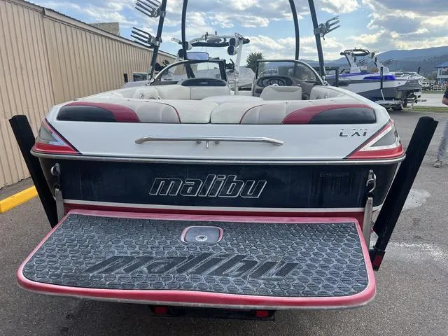 Slide: The Image of 2005 Malibu Sunsetter LXi boat rear view with swim platform. - 6