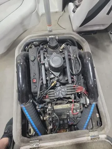 Slide: The Image of 2006 Moomba Outback engine compartment with visible components and wiring. - 4