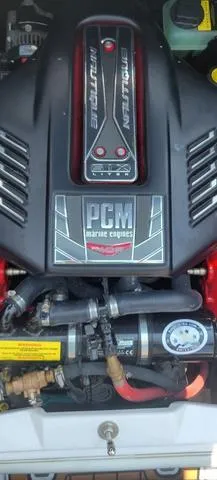 Slide: The Image of 2015 Nautique G23 PCM marine engine close-up. - 2
