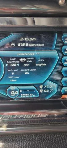 Slide: The Image of 2015 Nautique G23 dashboard display showing engine hours, speed, and preferences. - 3
