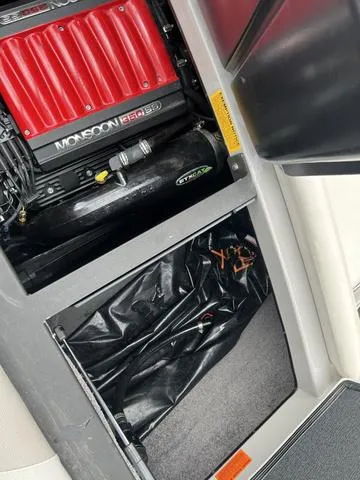 Slide: The Image of 2013 Malibu Wakesetter 22 MXZ engine compartment with Monsoon 350 motor. - 10