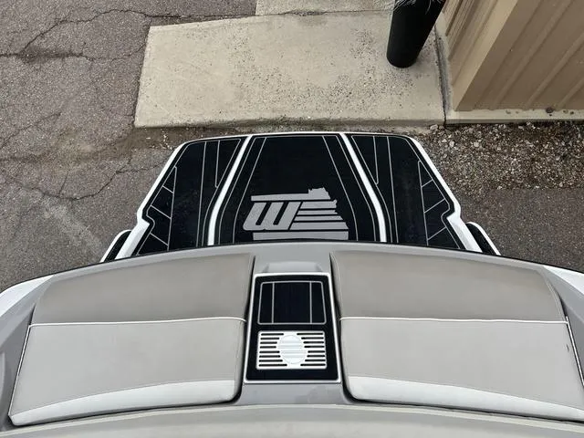 Slide: The Image of 2013 Malibu Wakesetter 22 MXZ boat deck with logo, viewed from above. - 11