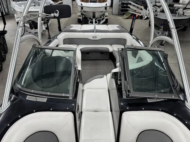 Slide: The Image of 2007 Supra 21V LTD engine compartment with visible components and wiring. - 7