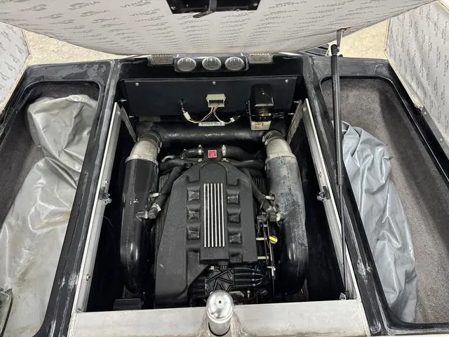 Slide: The Image of 2007 Supra 21V LTD boat speakers and tower in a showroom. - 8