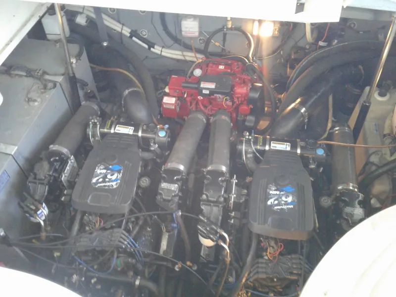 Slide: The Image of Engine compartment of a 2002 Sea Ray 320 Sundancer boat. - 16