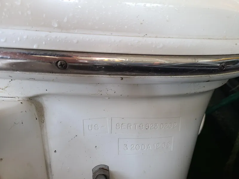 Slide: The Image of Close-up of 2002 Sea Ray 320 Sundancer boat hull identification number. - 18