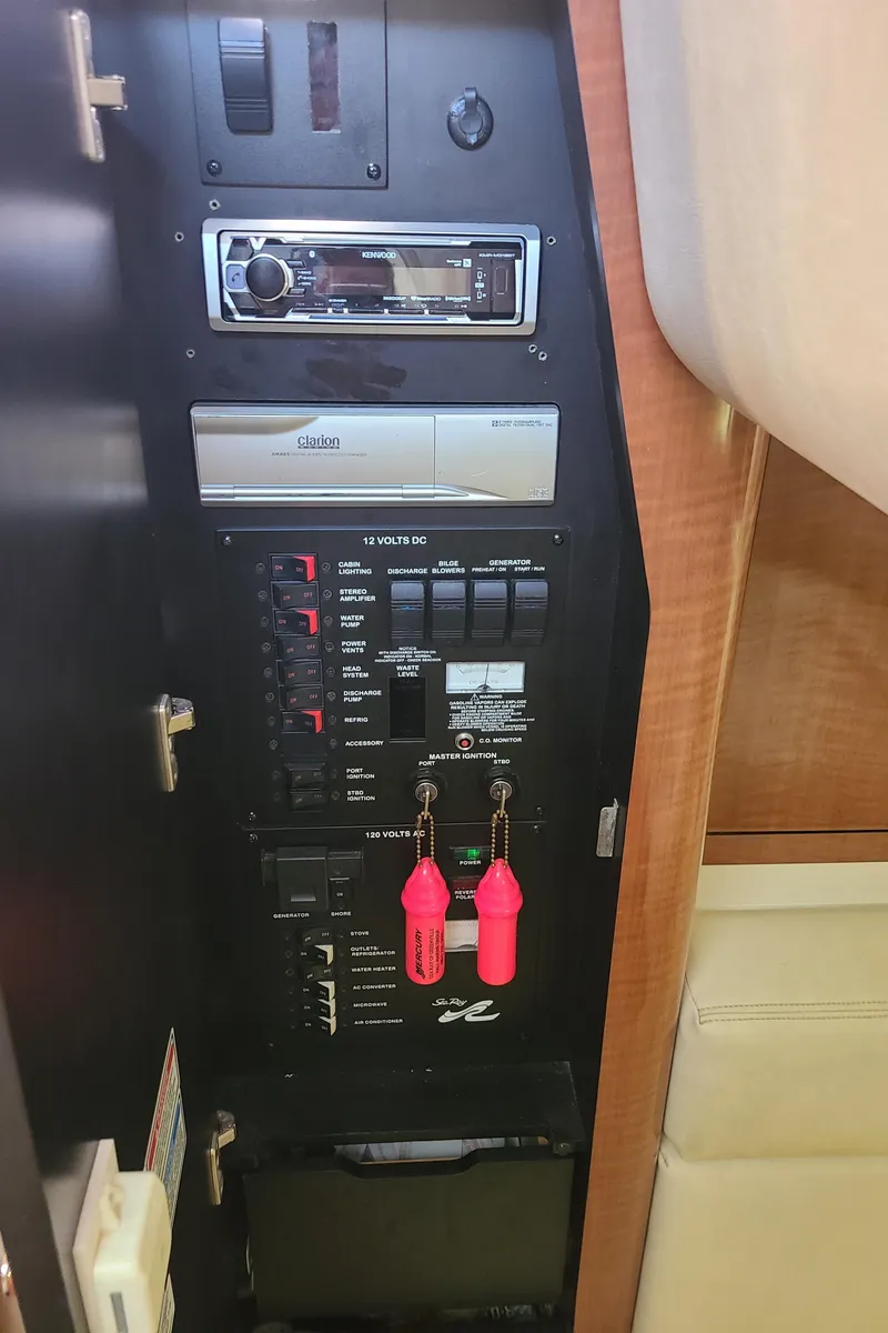 Slide: The Image of Control panel of a 2002 Sea Ray 320 Sundancer boat. - 47