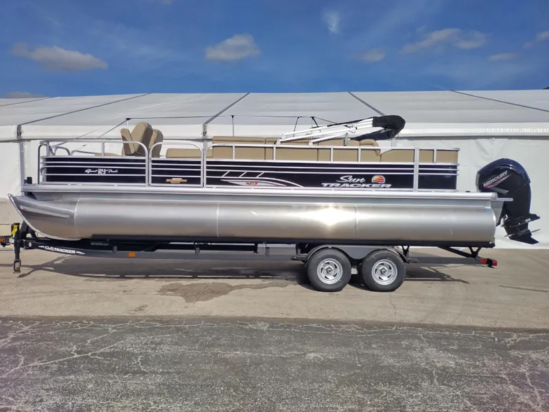 The Image of 2023 Sun Tracker Sportfish 24 XP3 pontoon boat on trailer. - 0