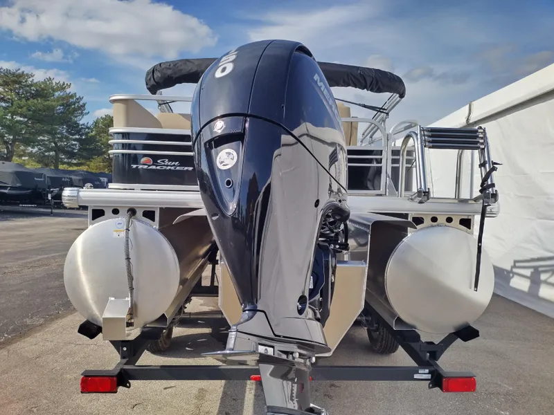 Slide: The Image of 2023 Sun Tracker Sportfish 24 XP3 pontoon boat with outboard motor. - 3