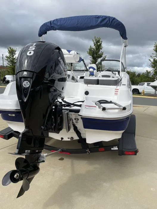 Slide: The Image of 2024 Tahoe 185 S boat with Mercury outboard motor, rear view. - 8
