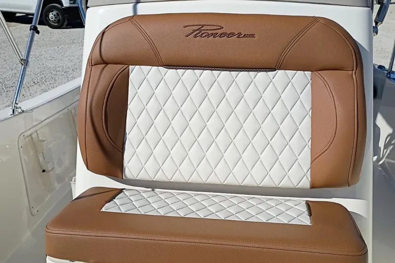 Slide: The Image of Brown and white leather seat on 2026 Pioneer 180 Sportfish boat. - 20
