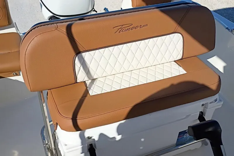 Slide: The Image of 2026 Pioneer 180 Sportfish boat seat with brown and white diamond-stitched upholstery. - 22