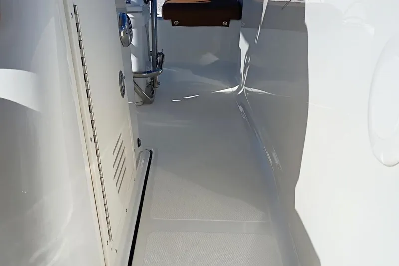 Slide: The Image of Interior view of 2026 Pioneer 180 Sportfish boat, showcasing sleek design and modern features. - 23