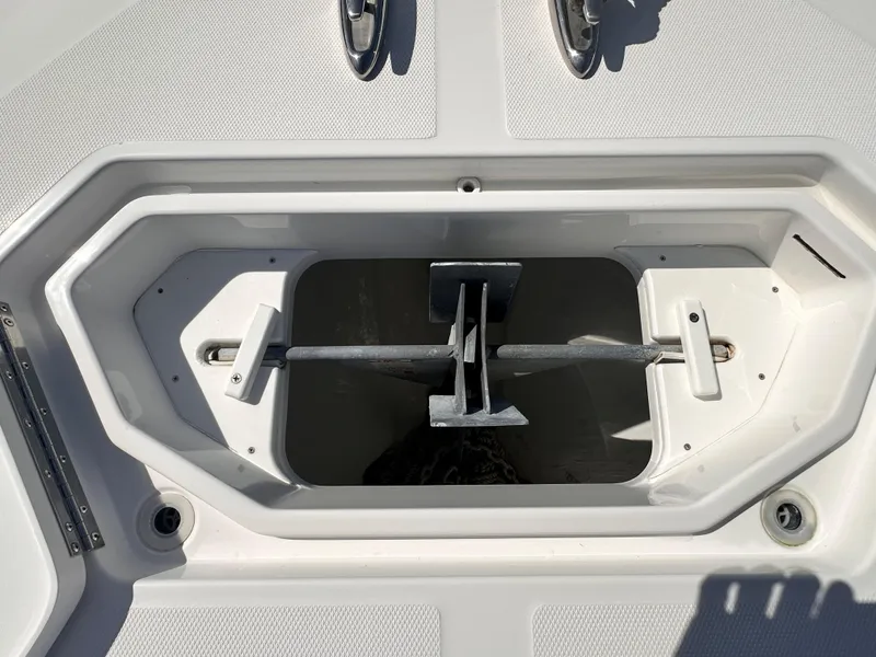 Slide: The Image of Anchor storage compartment on a 2017 Invincible 42 Center Cabin boat. - 11