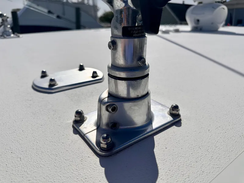 Slide: The Image of Close-up of a 2017 Invincible 42 Center Cabin boat's metal fixture on the deck. - 20