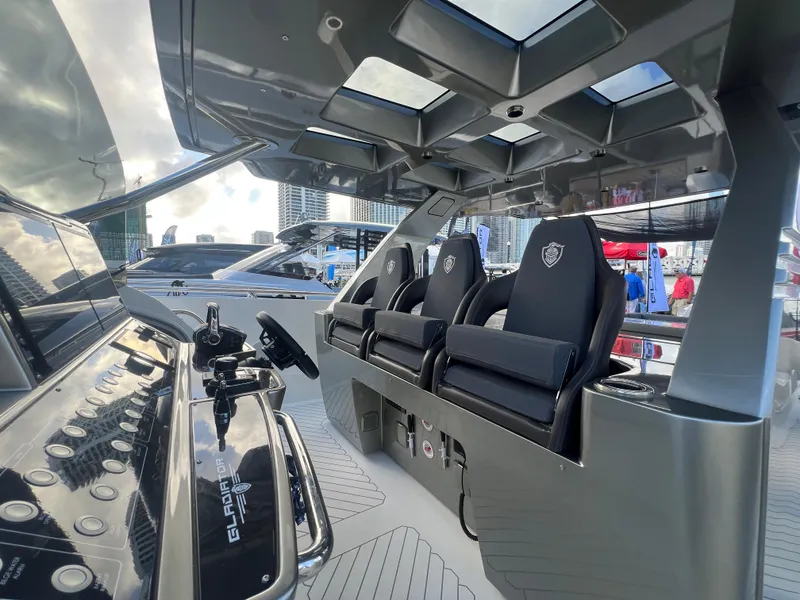 Slide: The Image of Interior of 2023 Canados 493 Gladiator yacht, featuring sleek design and modern seating. - 10